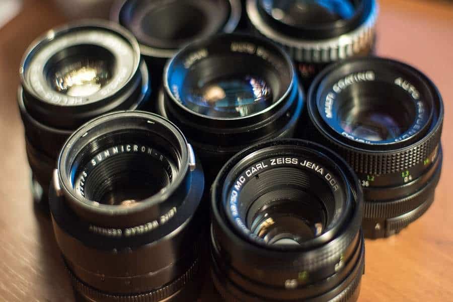 Vintage camera lenses on a table