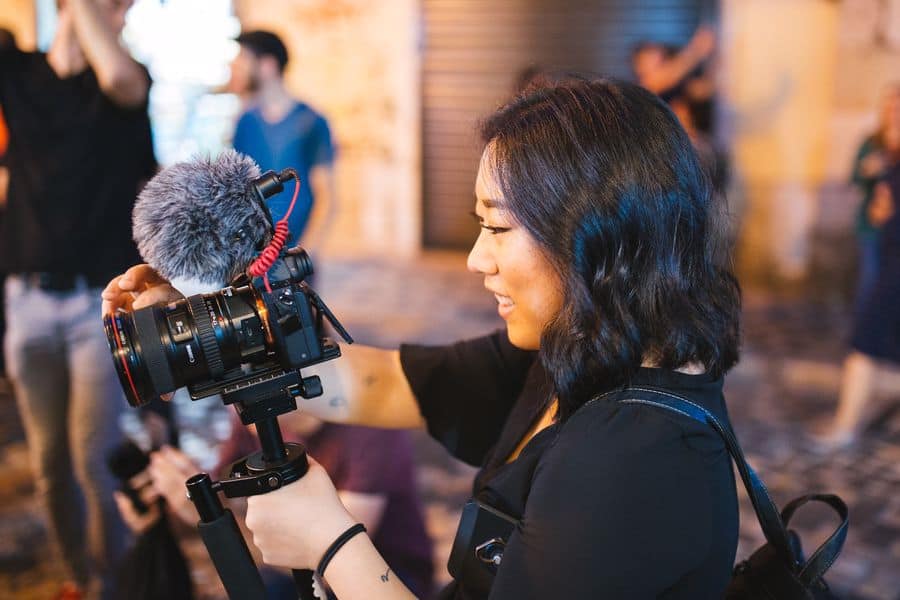Woman vlogging an event
