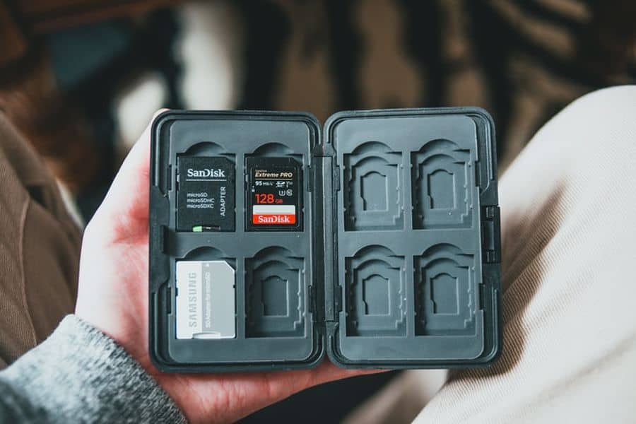 Person holding a case filled with memory cards