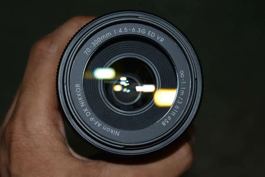 Hand holding a 70-300mm lens for Nikon cameras