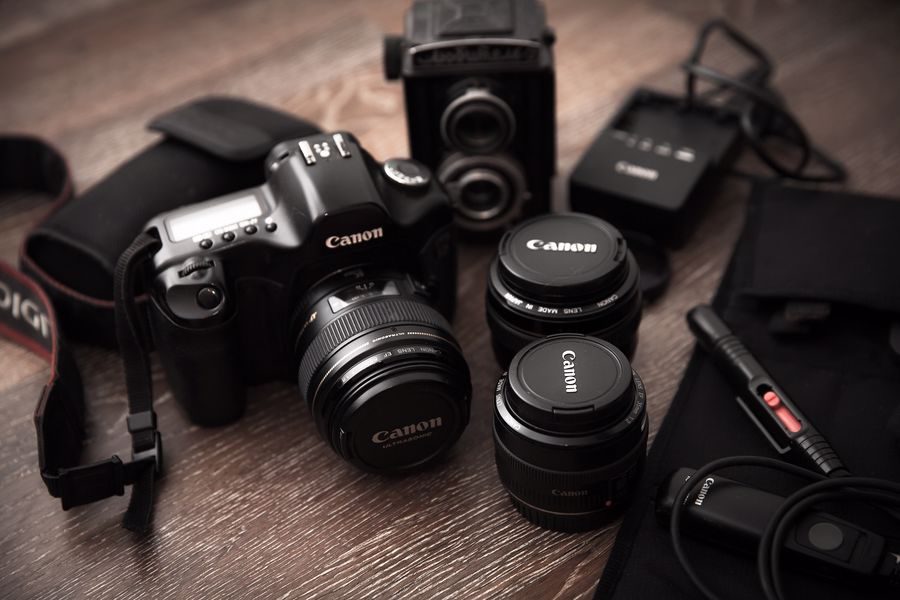 Canon camera with various lenses and gears