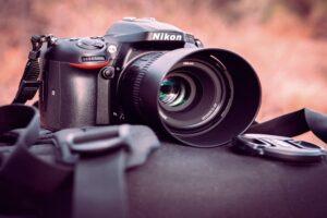 Nikon camera with strap and lens
